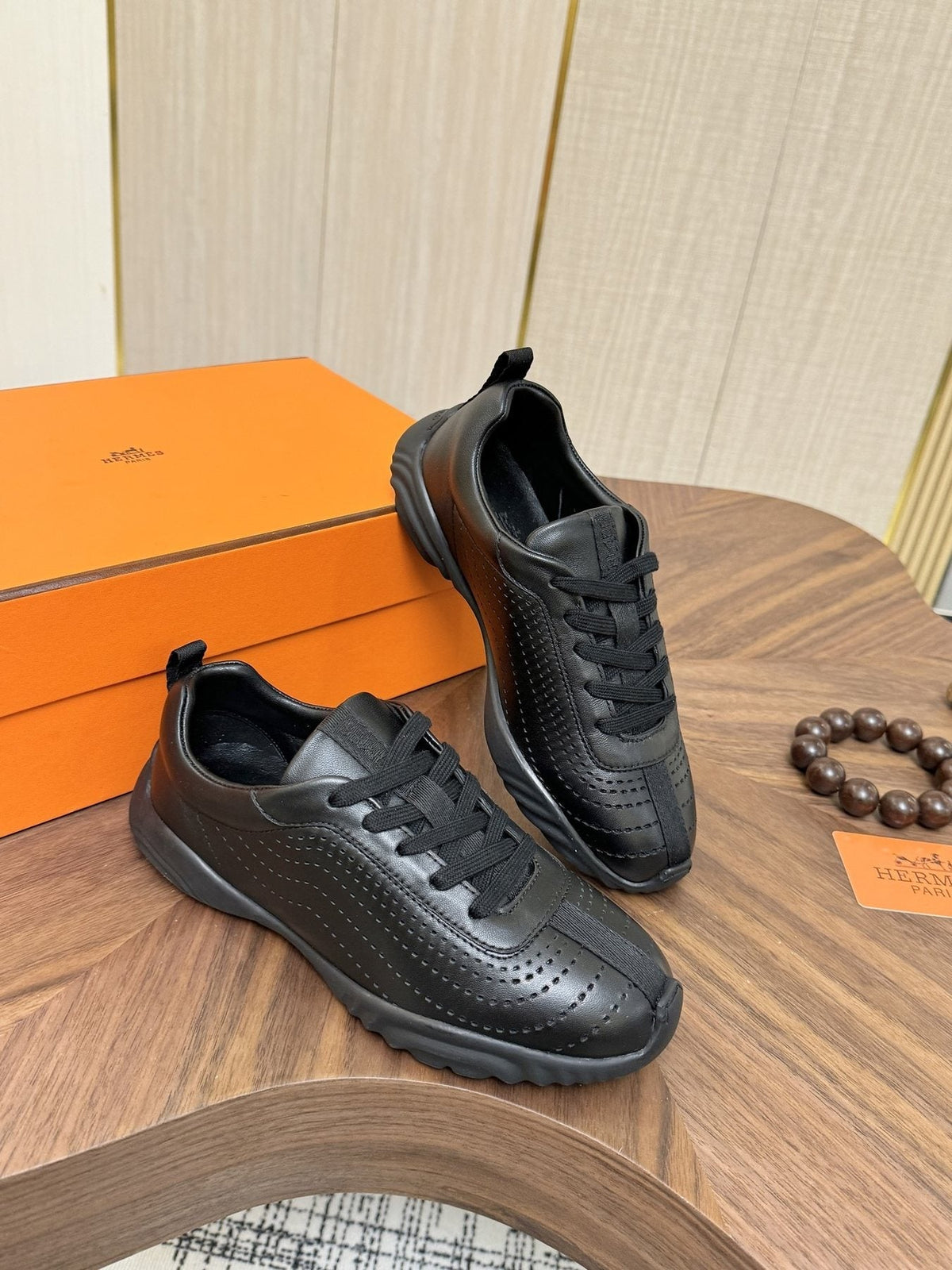 Hermès Perforated Low-Top Sneakers — front