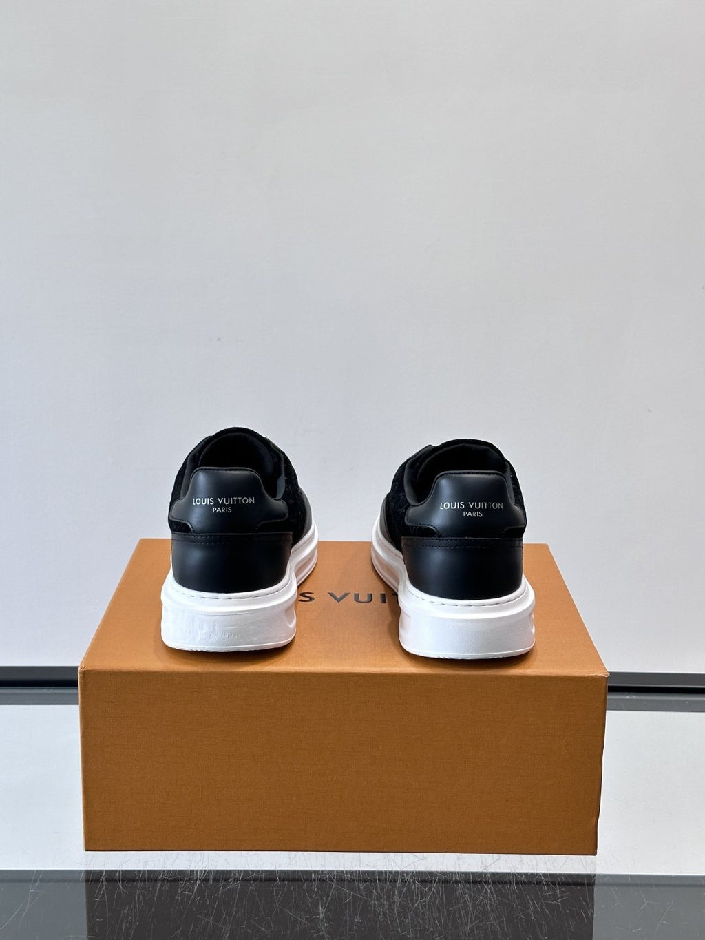 Louis Vuitton Embossed Low-Top Sneakers — back