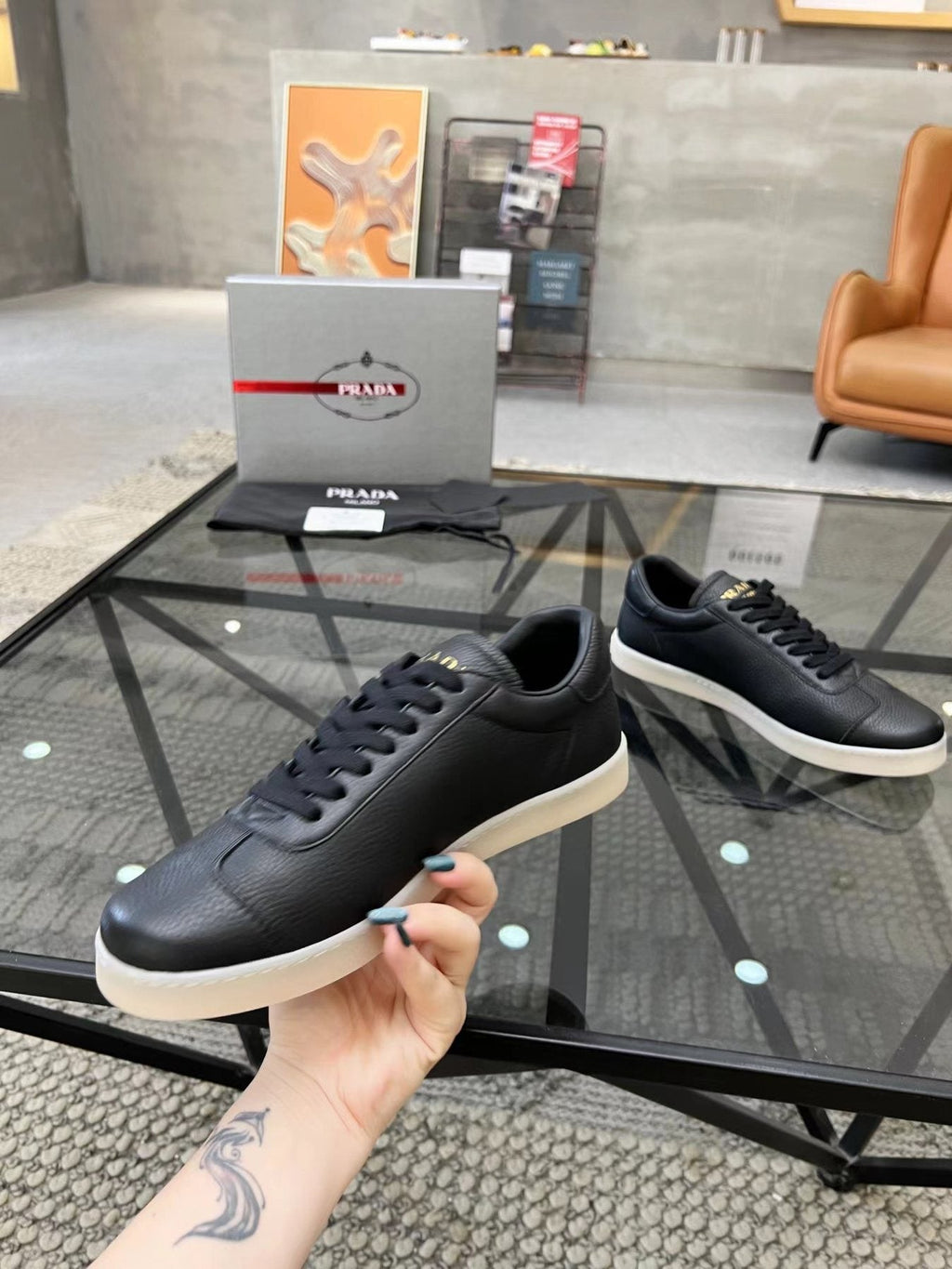 Prada Gold Accent Low-Top Sneakers — side