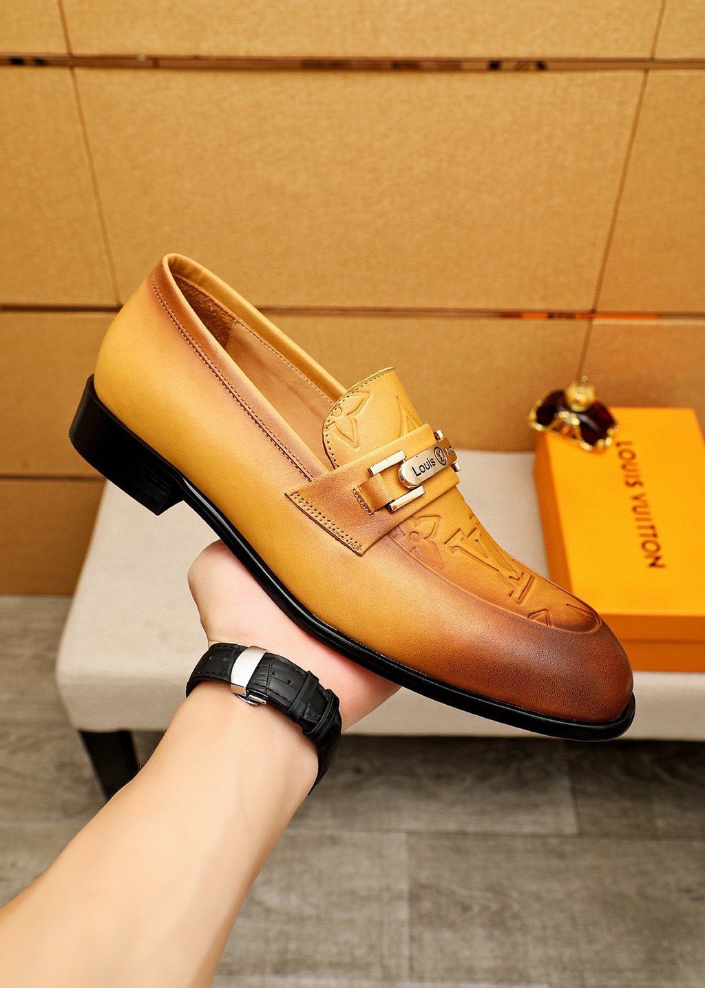 Louis Vuitton Embossed Metal-Bar Loafers — model